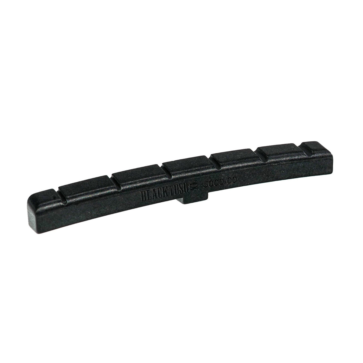 Angled view of a black six-slot guitar nut marked BLACK TUSQ 5000-00.